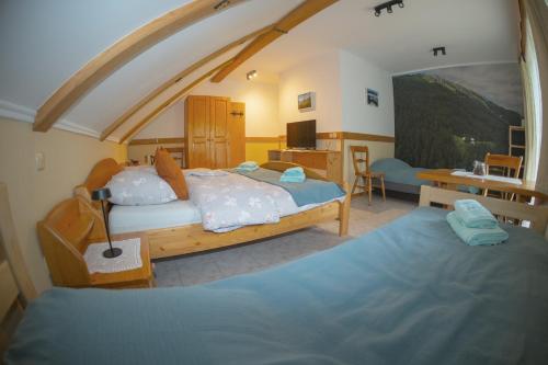 Postel nebo postele na pokoji v ubytování Guesthouse Draga