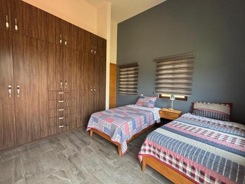 Casa Flores – Confort y estilo en Val'Quiricoにあるベッド