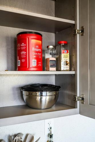 a kitchen with a counter with a bowl and spices at 2BR Luxury Getaway Mins to Beach Arcade & Games in Manhattan Beach