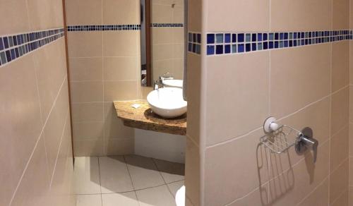 Un baño de Karaibes Hotel