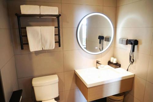 Ένα μπάνιο στο GreenTree Inn Suzhou Industrial Zone Yangcheng Lake Weiting Mong Kok Express Hotel