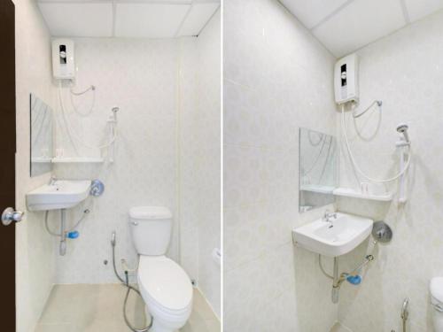 Vannituba majutusasutuses OYO 253 KK 11 Boutique Inn