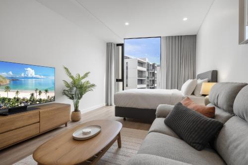 Una televisión o centro de entretenimiento en Fremantle Coast Studio Beach at your Doorstep