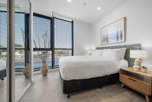 Postel nebo postele na pokoji v ubytování Stylish Studio Near Fremantle Cafés and Beaches