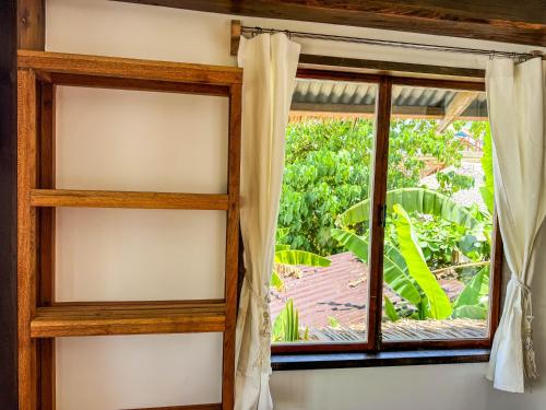 Κήπος έξω από το Cosy Villa & Apartments - Siargao
