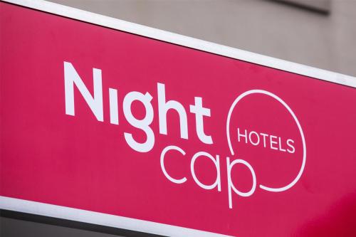 a red sign for a night lights cafe at Nightcap at Chester Hill Hotel in Bankstown