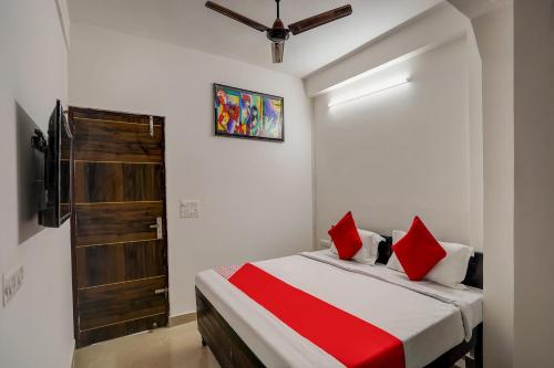 Ένα ή περισσότερα κρεβάτια σε δωμάτιο στο Hotel O PubG Residency