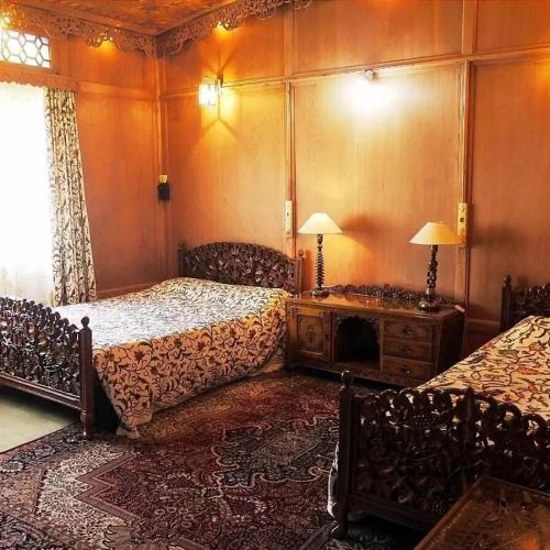 Cama o camas de una habitación en The Heritage Group Of Houseboats