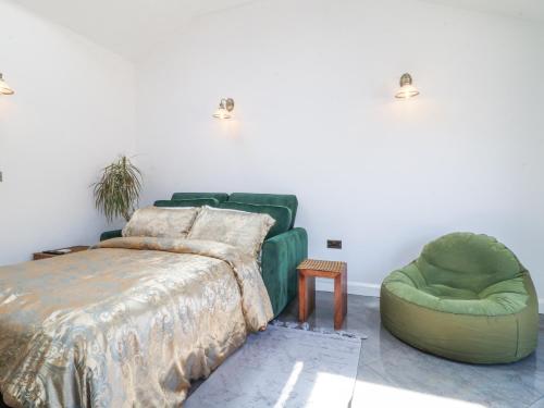 En eller flere senge i et værelse på La Casa Lipa