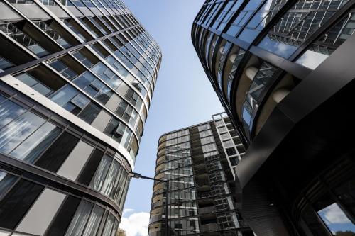 two tall buildings next to each other at Self-Contained Apartment in Woden By Serain in Phillip