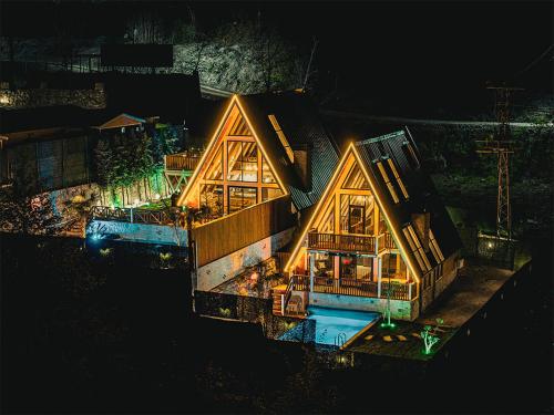 an overhead view of a large house with lights at Grand Paradise Resort Sapanca in Sapanca