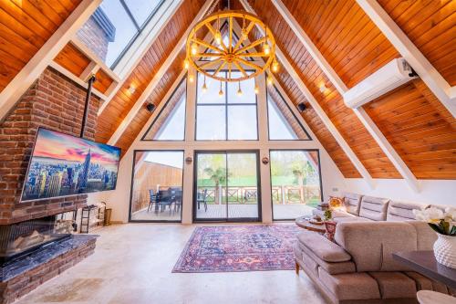 a large living room with a large window at Grand Paradise Resort Sapanca in Sapanca