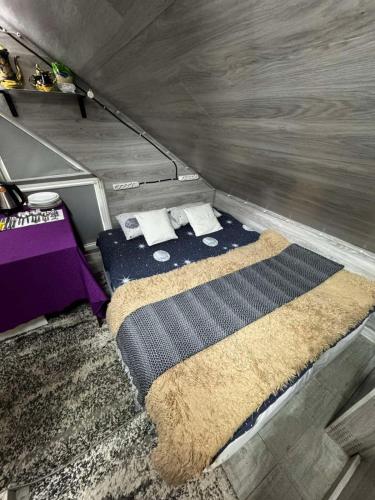 Llit o llits en una habitació de DasCapri