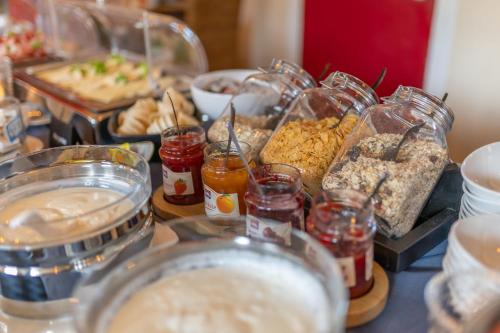 a buffet with many different types of food on a table at Gut Basthorst in Basthorst