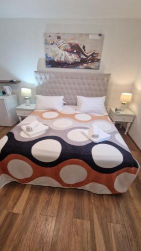 Postel nebo postele na pokoji v ubytování Apartments Ante 1