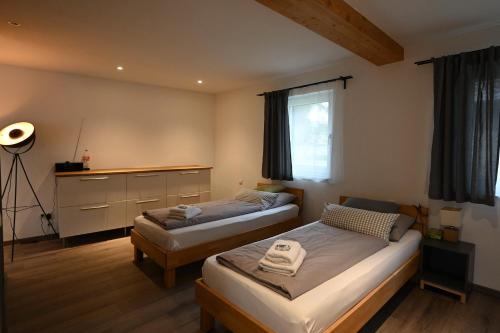 Postel nebo postele na pokoji v ubytování Guesthouse-Coburg 2