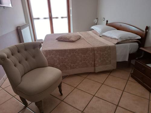 Ein Bett oder Betten in einem Zimmer der Unterkunft Cà 'd Gnese