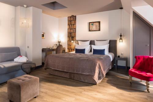 Кровать или кровати в номере Hotel Mademoiselle