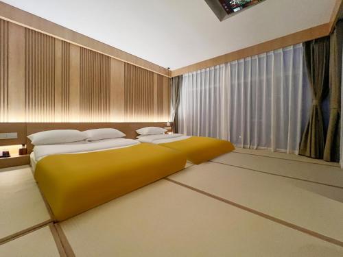 vchill hotelにあるベッド