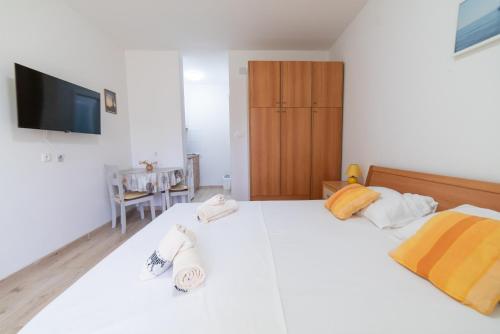 Ένα ή περισσότερα κρεβάτια σε δωμάτιο στο Guest House Nikola