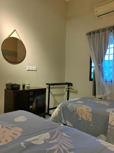 Ένα ή περισσότερα κρεβάτια σε δωμάτιο στο Hfhomestay