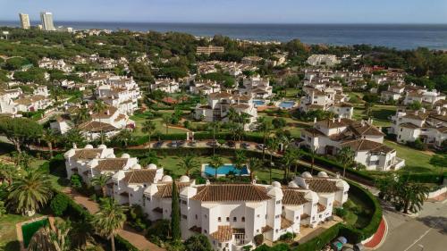 2 storey townhouse with large terrace garden, BBQ and close to the beach, in Elviria, Marbella