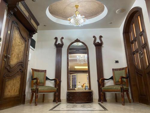 Posezení v ubytování New Cairo Home