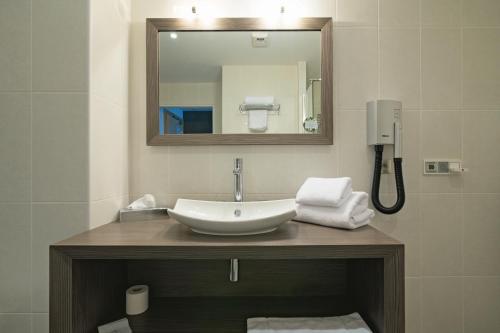 Ein Badezimmer in der Unterkunft Le Konine - Hotel & Bar & Restaurant