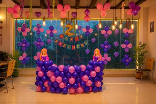 a bunch of purple balloons in a room at Hotel The Heights in Haridwār