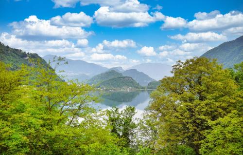 a view of a lake with mountains in the background at 2 Bedroom Cozy Apartment In Arsiè in Arsiè