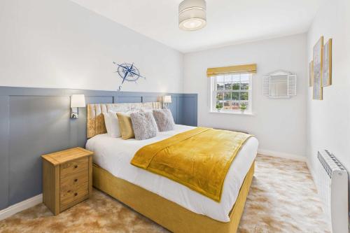 a bedroom with a large bed and a window at Host & Stay - Starboard Bow in Whitby