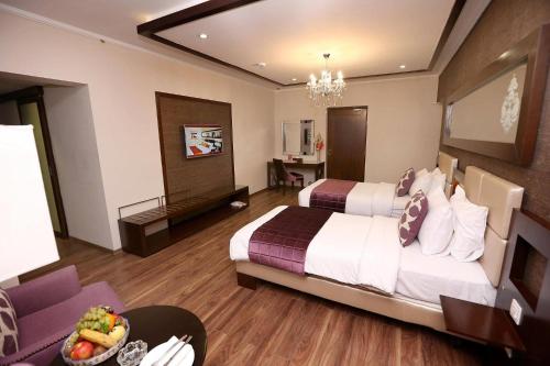 Cama o camas de una habitación en Ramada by Wyndham Multan