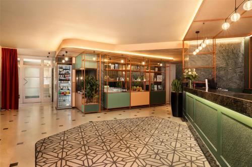 Lounge nebo bar v ubytování NH Brussels Carrefour de L’Europe