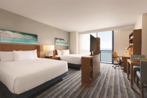 Postel nebo postele na pokoji v ubytování Hyatt House Virginia Beach / Oceanfront