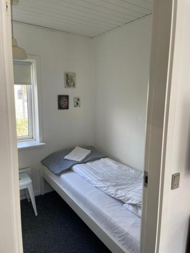 Katil atau katil-katil dalam bilik di Motel Hune Apartments