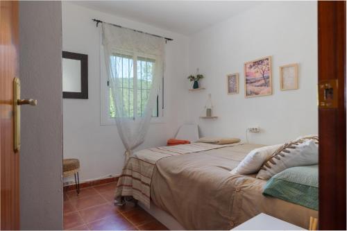 Postel nebo postele na pokoji v ubytování Villa Rural Las Nubes