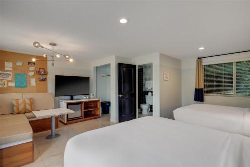 Letto o letti in una camera di Calistoga Motor Lodge and Spa