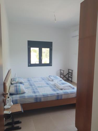 Ένα ή περισσότερα κρεβάτια σε δωμάτιο στο Villa Macky