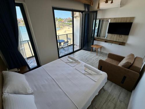 Ένα ή περισσότερα κρεβάτια σε δωμάτιο στο Kerpe Askoroz Otel