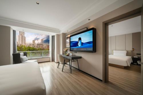 Postel nebo postele na pokoji v ubytování Atour Hotel Chengdu Taikoo Li Riverside