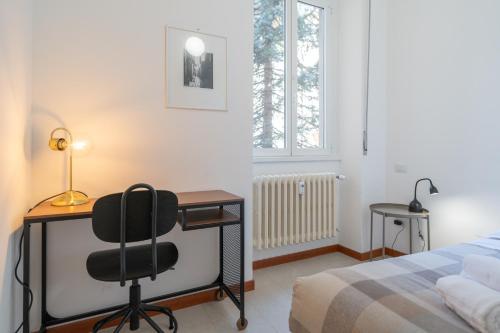 Postel nebo postele na pokoji v ubytování Merate Tre Spade