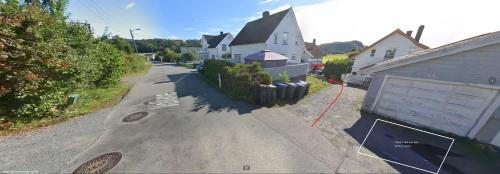 an aerial view of a residential street with houses at Mikael's Bed & Spa apartment in Sandefjord