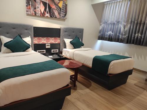 Postel nebo postele na pokoji v ubytování Empyrean Resort