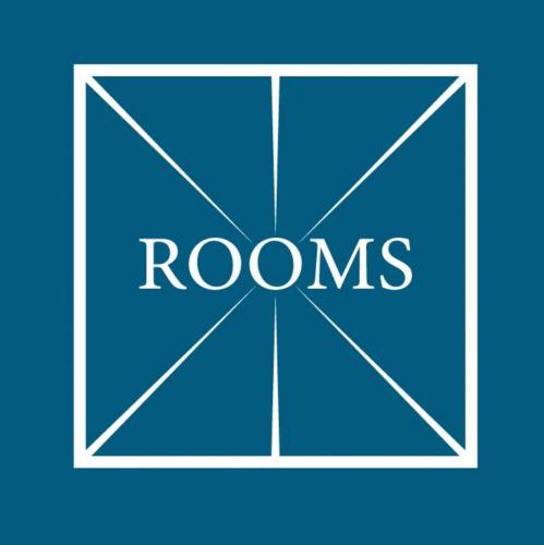 a blue box with the words rooms on it at ROOMS,REGGIO AFFITTACAMERE con Bagno Privato, TV, Clima , Wi-Fi in Reggio Emilia