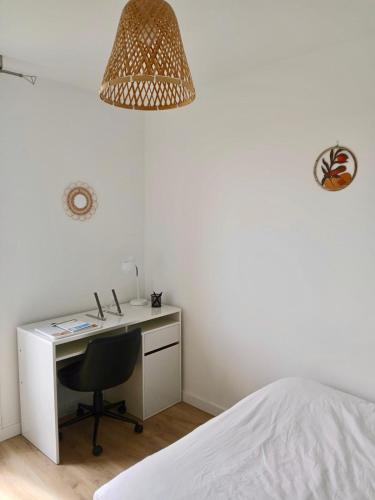 Cama o camas de una habitación en Appartement lumineux - 6 pers - 3 chambres - Parking gratuit - Tout équipé