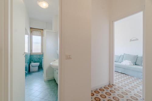 Postel nebo postele na pokoji v ubytování GuestHost - Cozy Flat in the Heart of Rapallo
