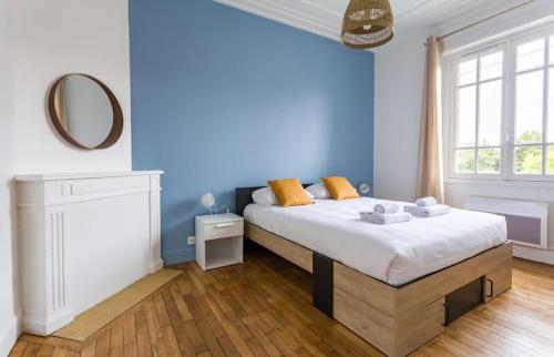 Posteľ alebo postele v izbe v ubytovaní Saint-Exupery - Bel appartement rénové/Parking