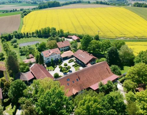 an aerial view of a house with a yard at Gut Schwarz-n Hof Ferienwohnungen in Bad Griesbach