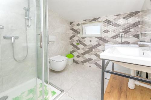 Kúpeľňa v ubytovaní Apartments Olivera