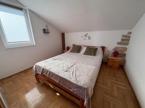 Posteľ alebo postele v izbe v ubytovaní Apartments Neno